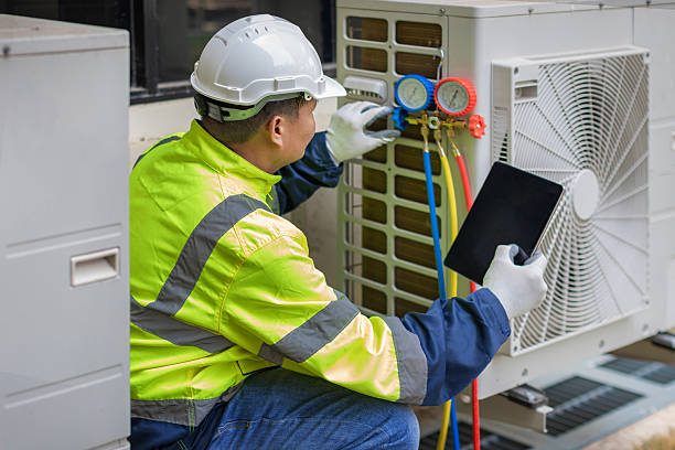 Professional Emergency Ac Repair technician working in Riverside, IA